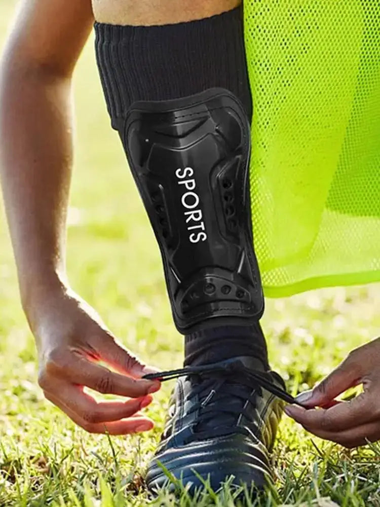 Caneleira de futebol infantil